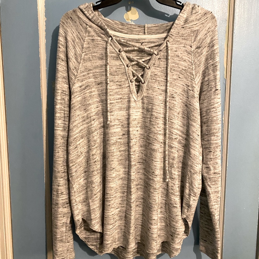 Long sleeve hooded lace up sweater